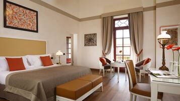Premium bedding, down duvets, minibar, in-room safe