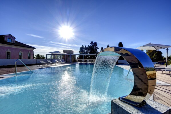 Seasonal outdoor pool, pool loungers