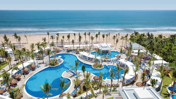 5 outdoor pools, pool umbrellas, pool loungers