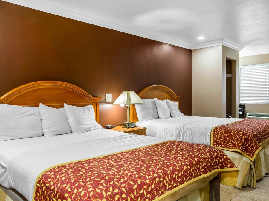 Desk, laptop workspace, iron/ironing board, free cots/infant beds