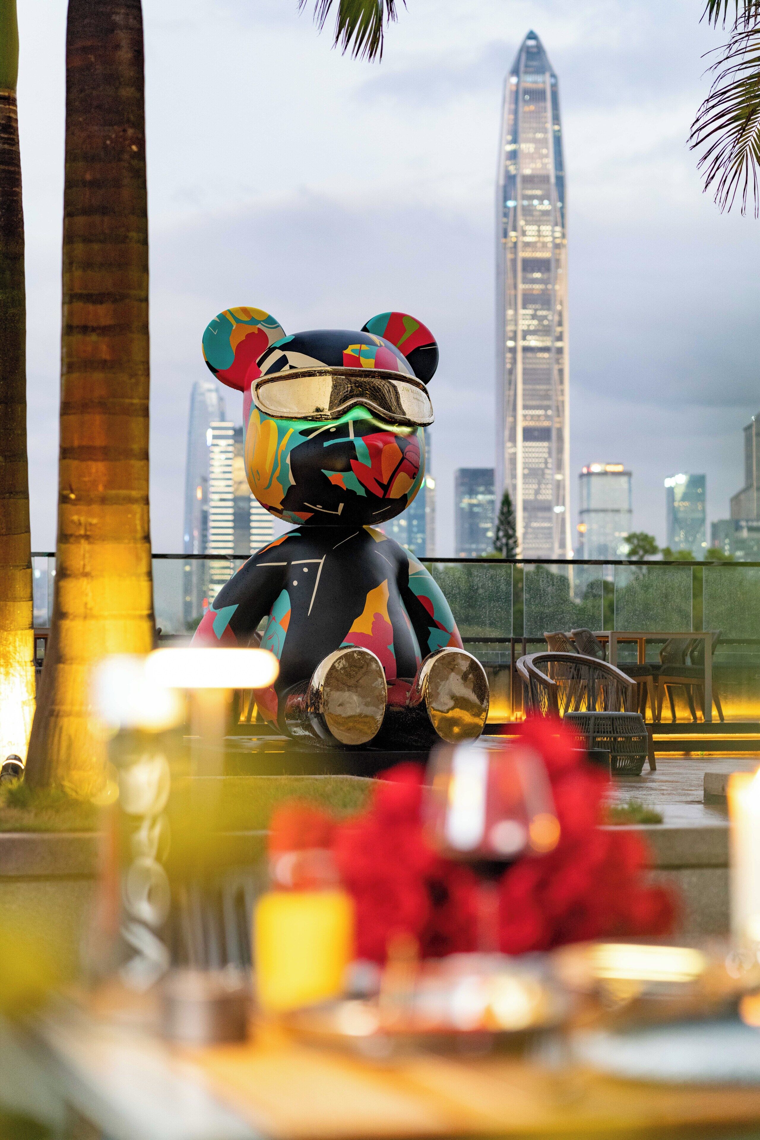 outdoor pool, open 7:00 am to 10 pm, pool umbrellas, pool loungers