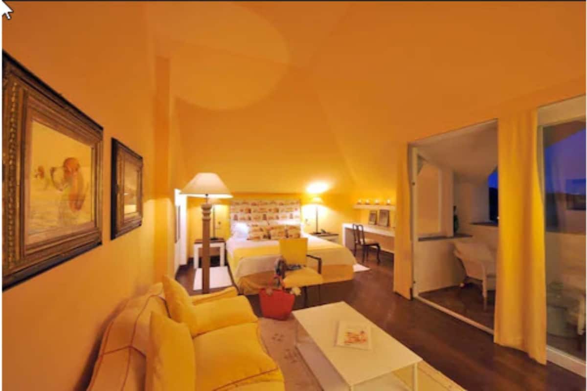 suite | living room | 18-inch tv with satellite channels, dvd player, pay films