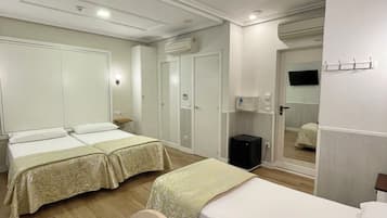 Standard Triple Room | Desk, iron/ironing board, free WiFi, bed sheets