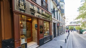 A hotel facade with a prominent sign reading "HOTEL MADRID ESPARTEROS". - Hostal Madrid (Madrid)