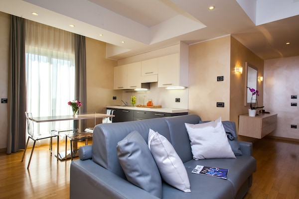 40-inch flat-screen TV with satellite channels, TV