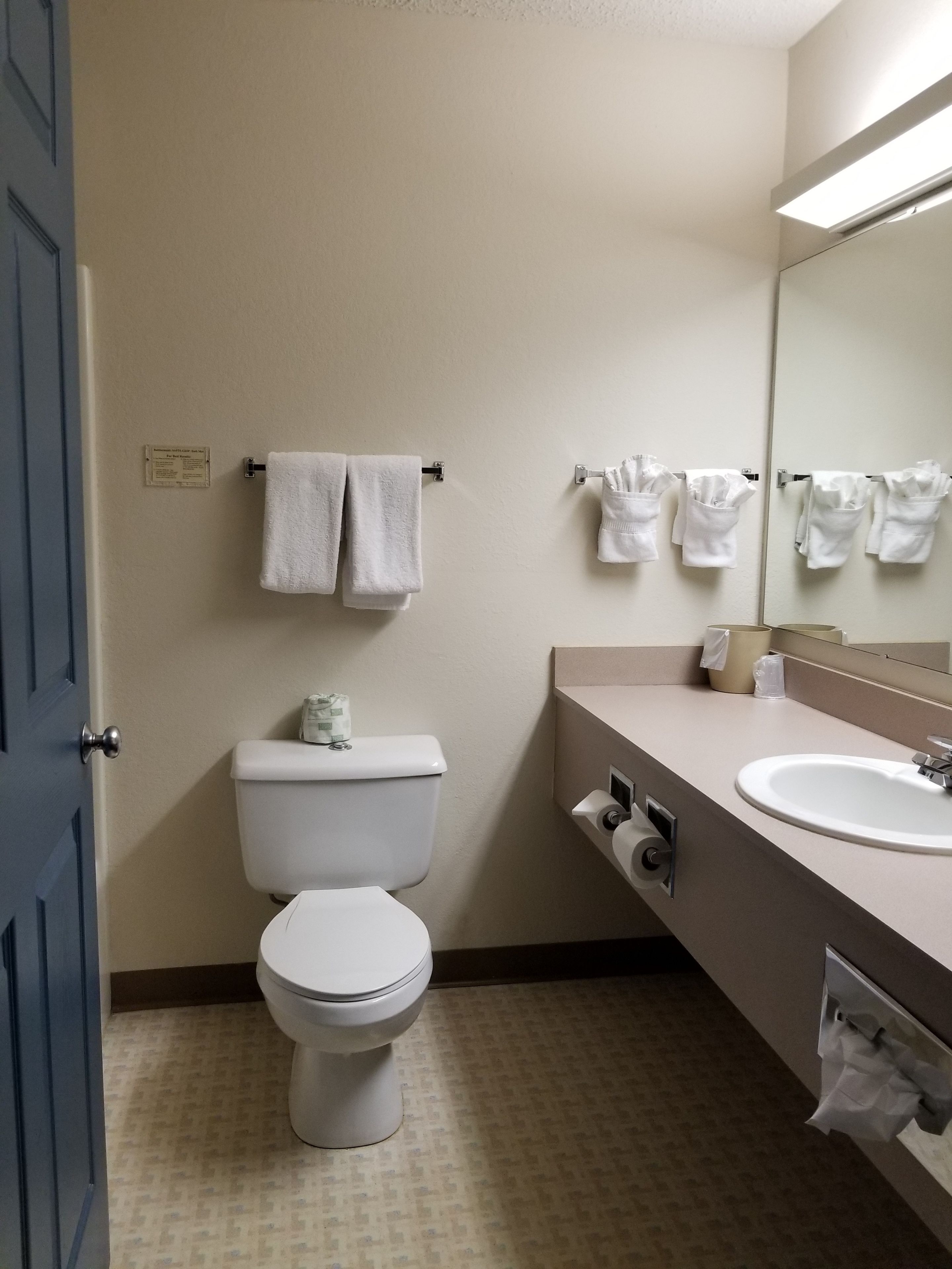 standard double room, 2 queen beds, non smoking, refrigerator & microwave | bathroom | combined shower/bathtub, free toiletries, hair dryer, towels