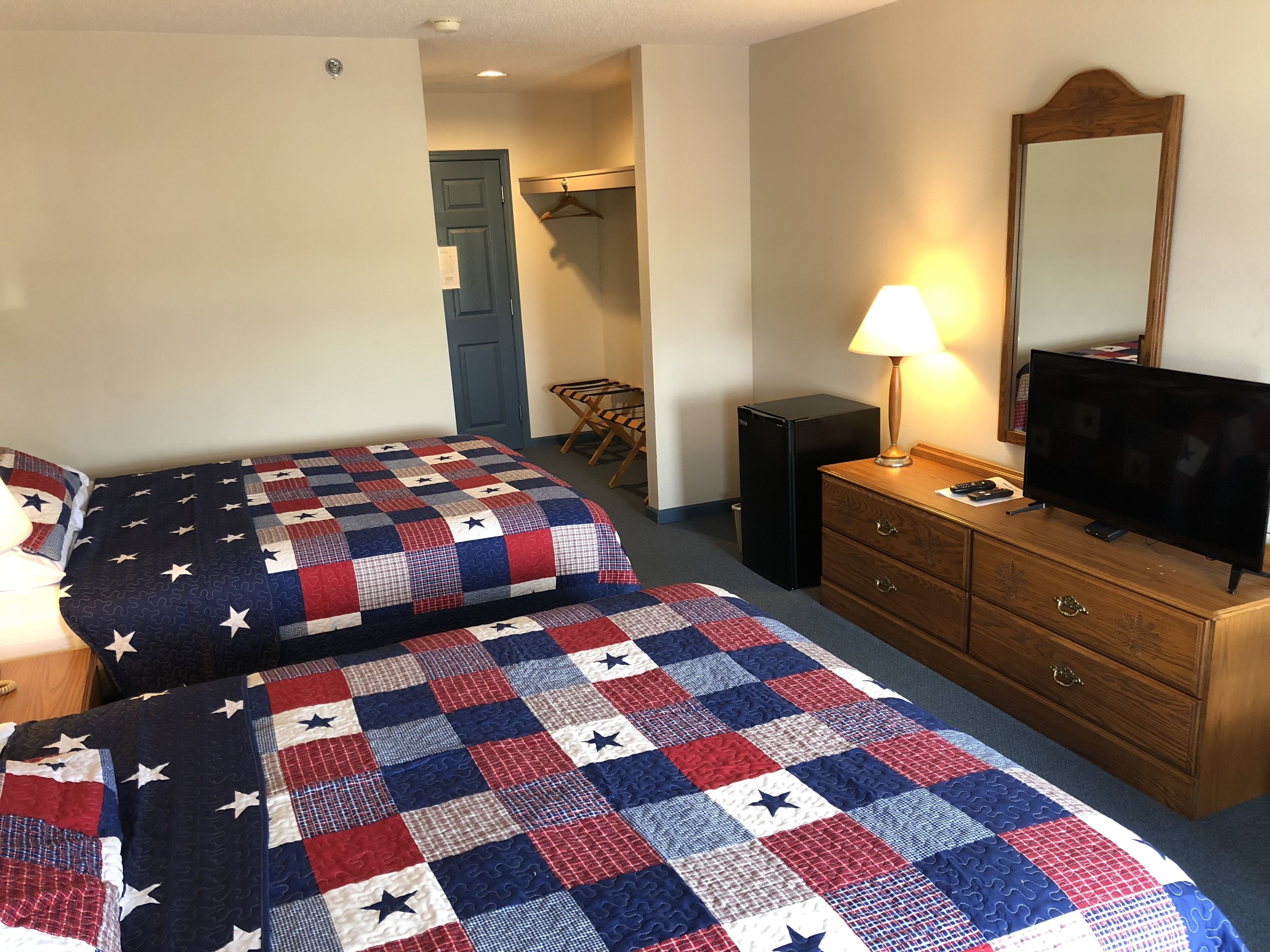 standard double room, 2 queen beds, non smoking, refrigerator & microwave | free wifi, bed sheets