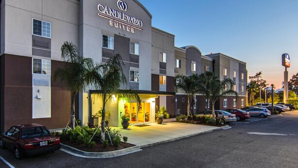 A hotel with a modern design, featuring a prominent sign for Candlewood Suites. - Candlewood Suites Jacksonville East Merril Road by IHG (Jacksonville)