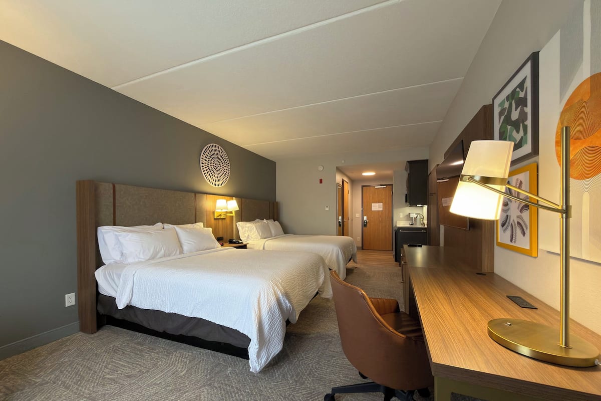 Desk, blackout drapes, iron/ironing board, free cribs/infant beds