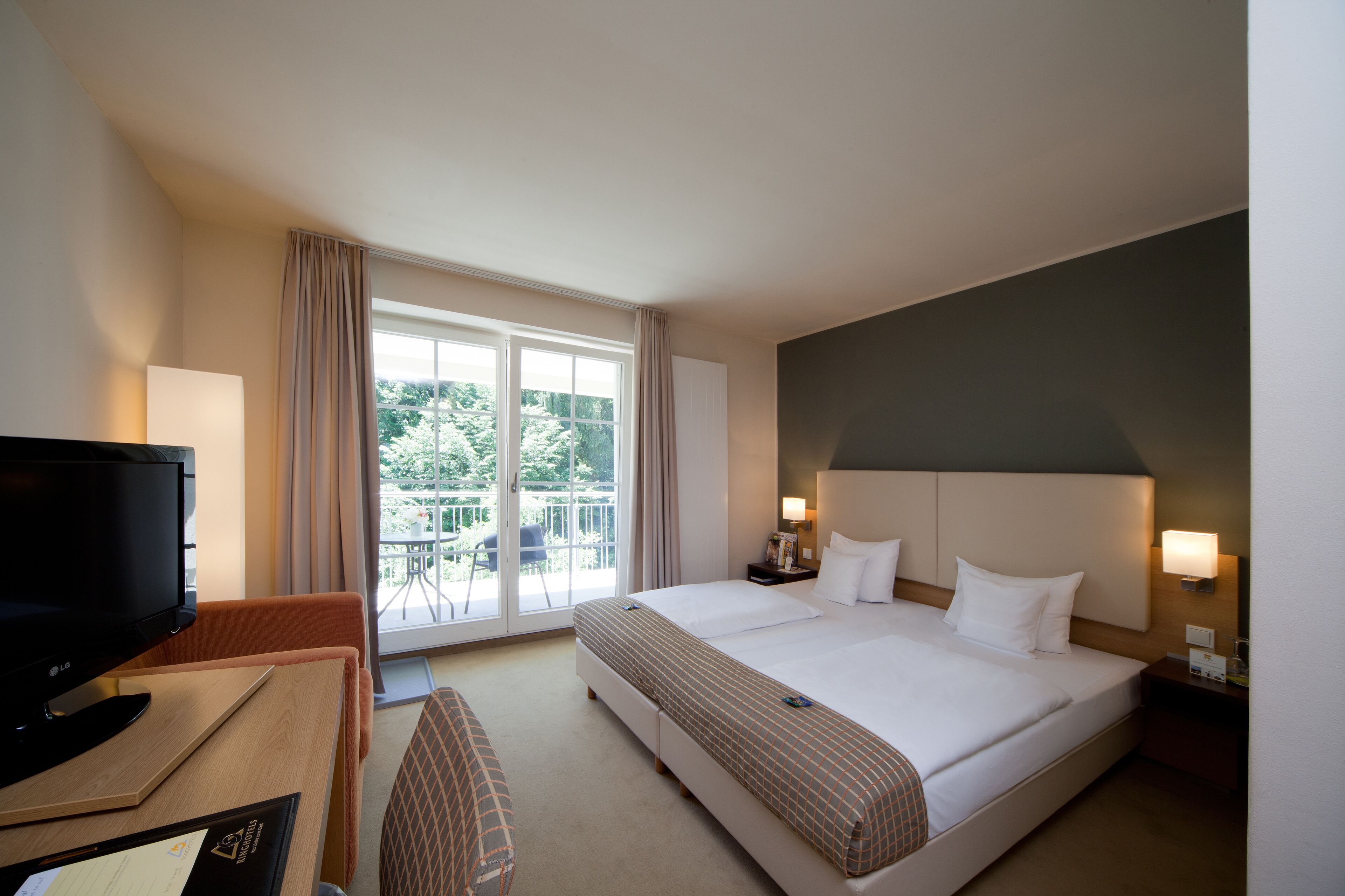 standard double room, balcony | in-room safe, desk, blackout curtains, wheelchair access