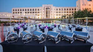 A rooftop pool area with lounge chairs and a barbecue grill setup. - Crowne Plaza Sohar by IHG (Sohar)