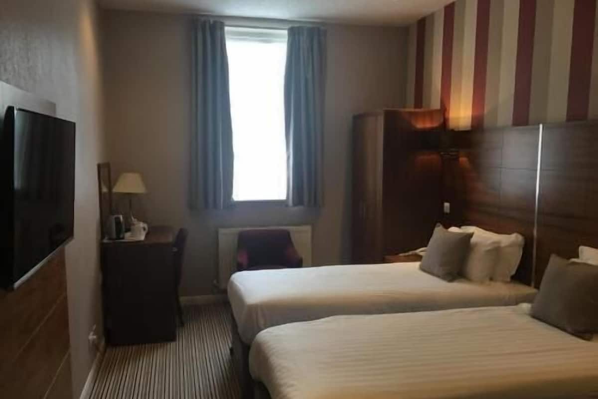 Desk, iron/ironing board, free WiFi, bed sheets