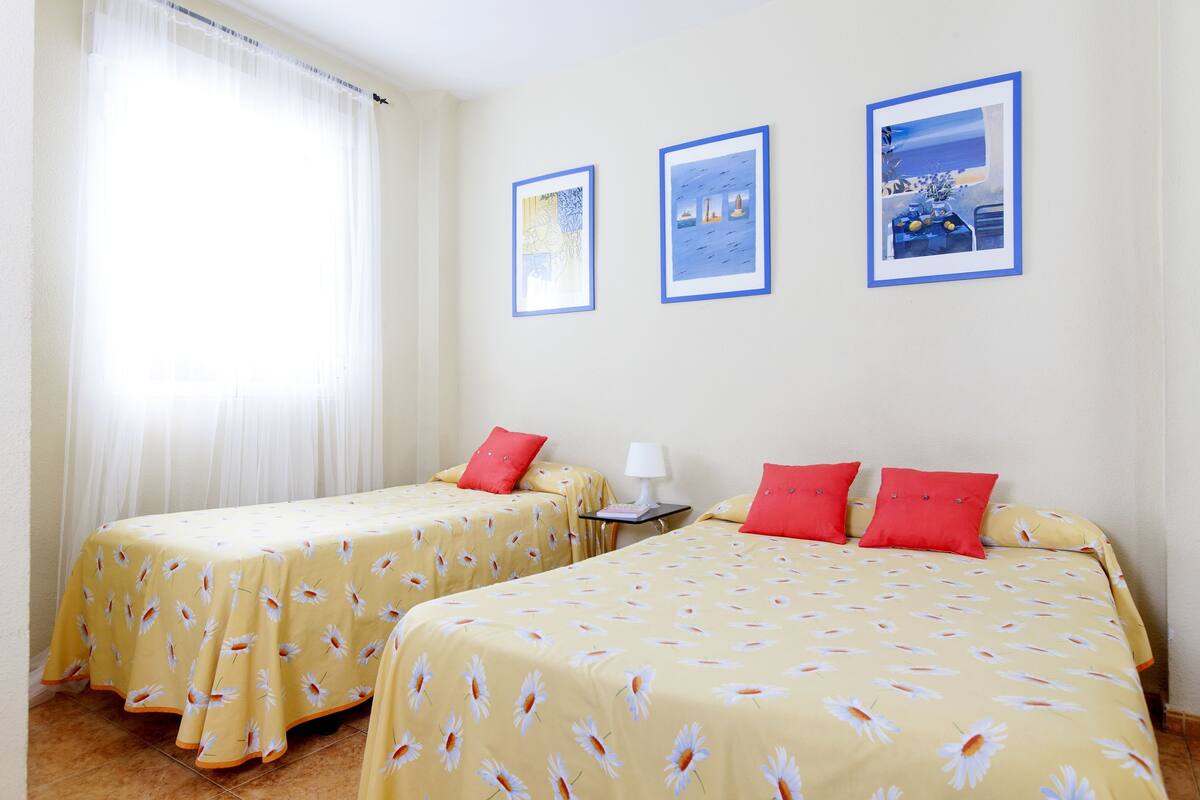 Triple Room, Shared Bathroom | Memory foam beds, in-room safe, laptop workspace