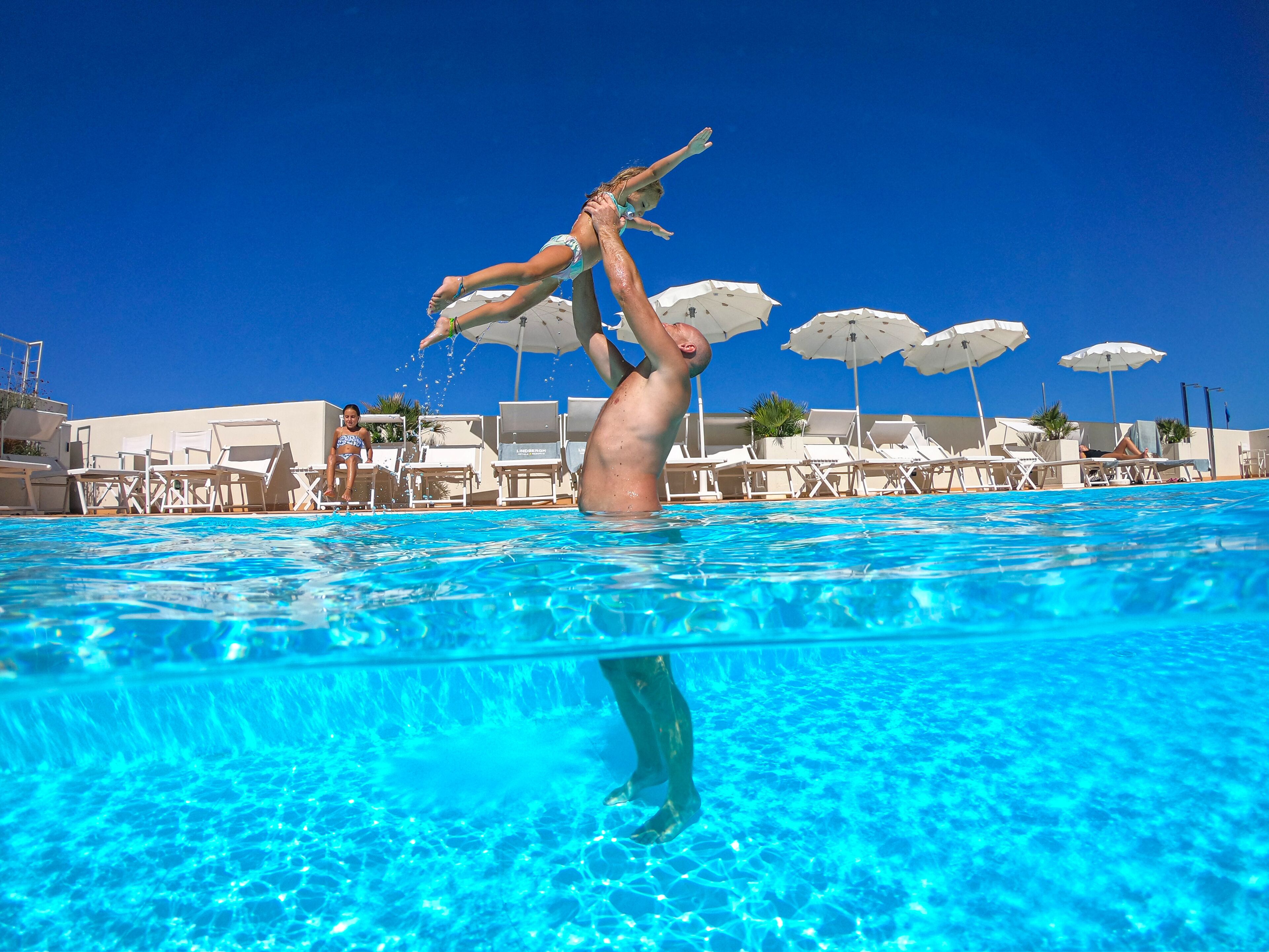 Seasonal outdoor pool, pool umbrellas, sun loungers