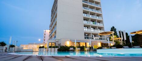 Seasonal outdoor pool, pool umbrellas, pool loungers