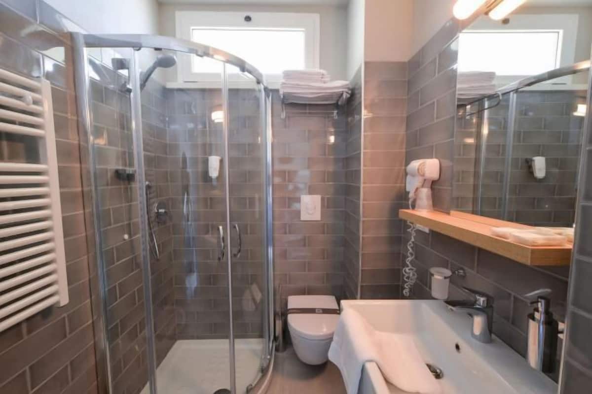 Bathroom | Hair dryer, bidet, towels