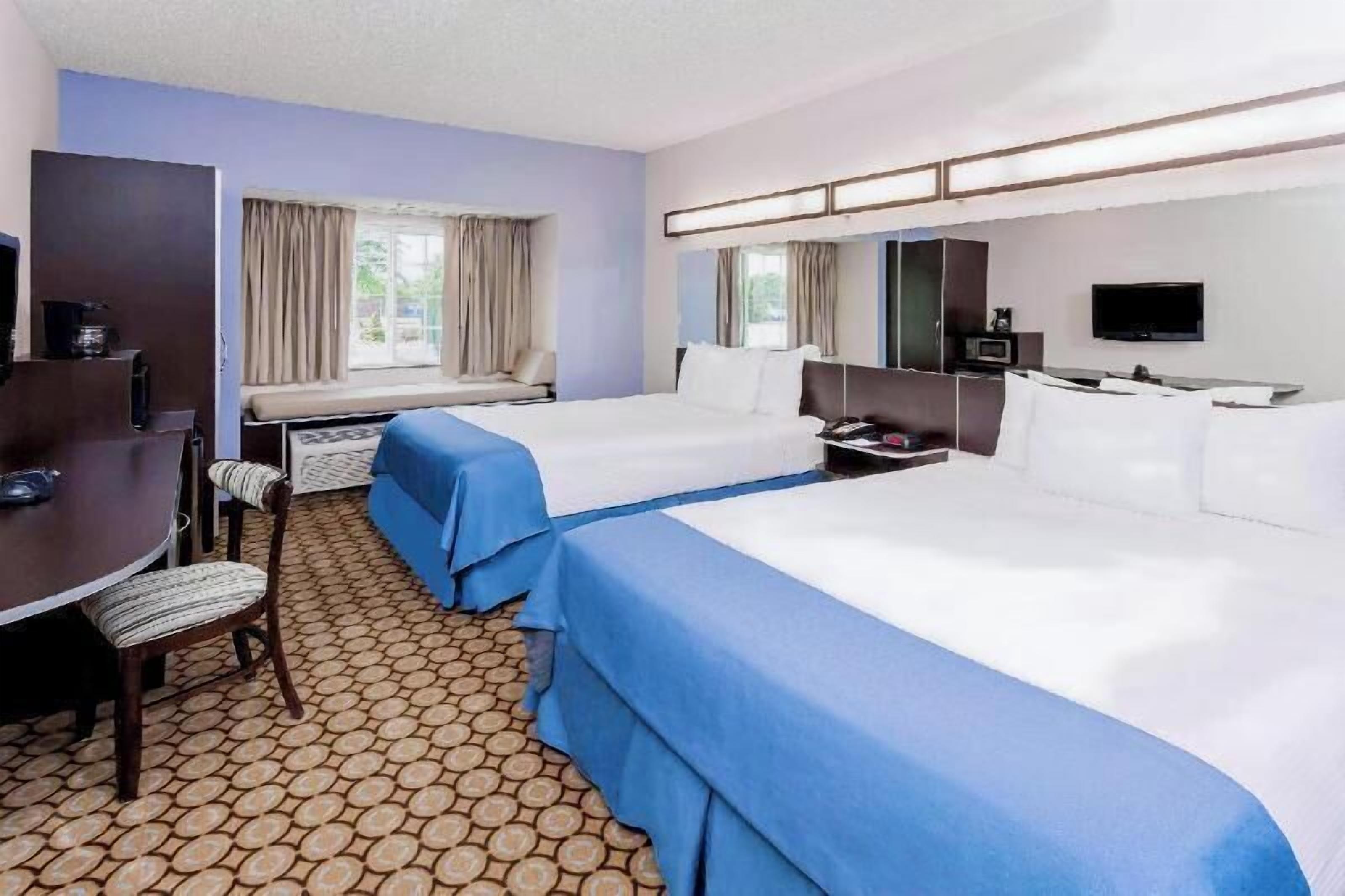 Pillowtop beds, in-room safe, desk, laptop workspace