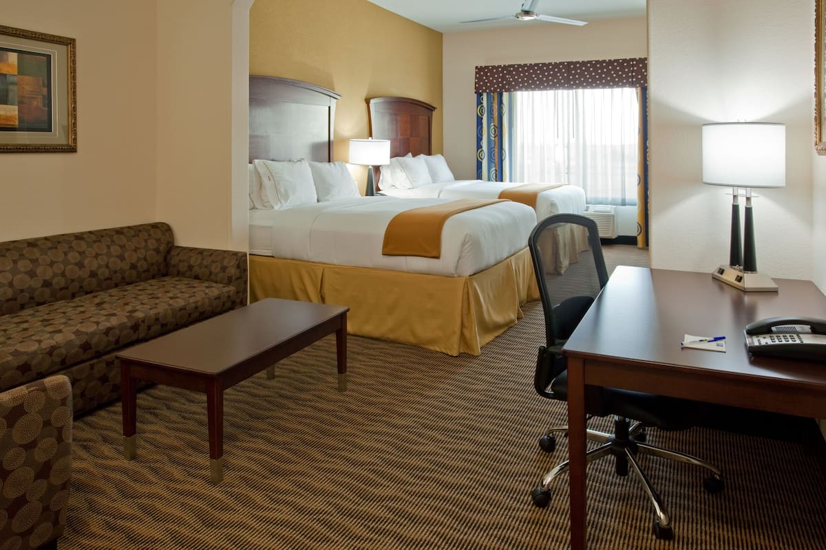 Suite, 2 Queen Beds | Desk, soundproofing, iron/ironing board, free cribs/infant beds