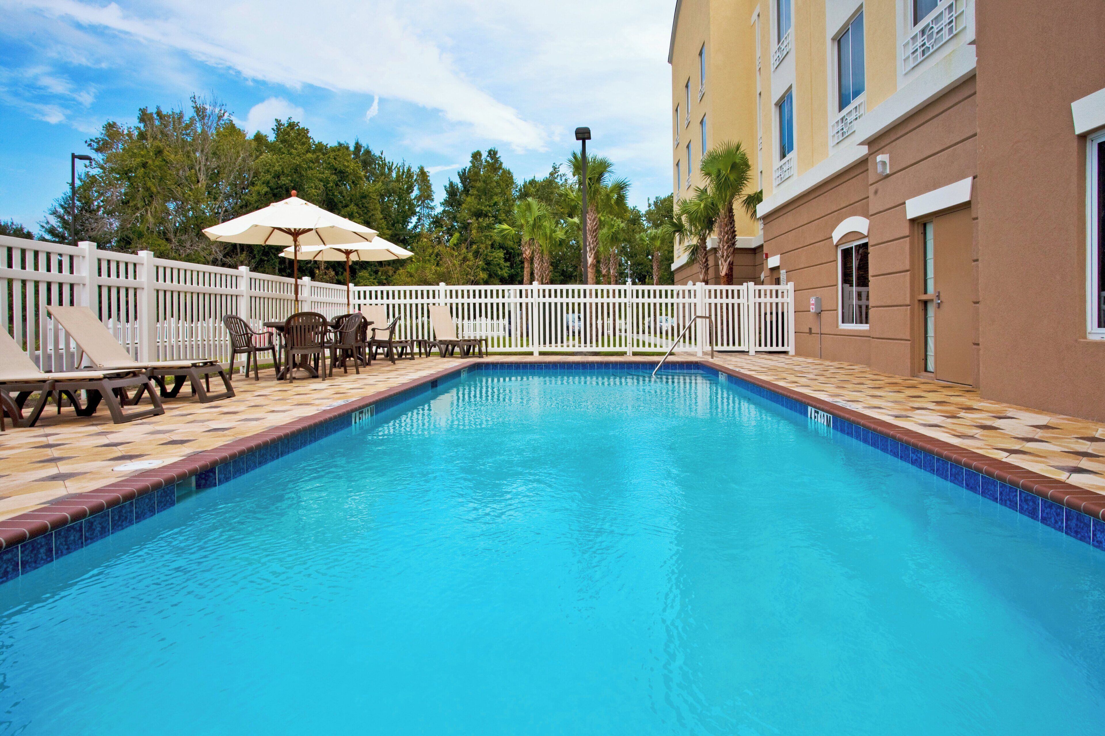 Outdoor pool, open 9:00 AM to 9:00 PM, pool umbrellas, sun loungers