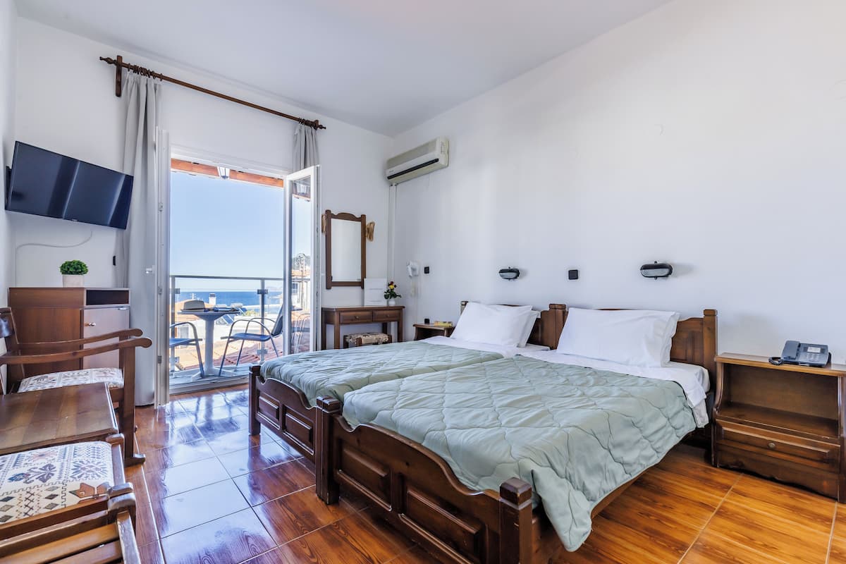 Side Sea View Room | Iron/ironing board, free WiFi, bed sheets