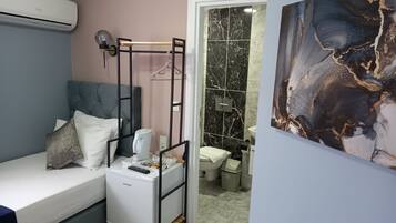 Economy Single Room, 1 Single Bed, Private Bathroom | 1 bedroom, premium bedding, memory-foam beds, in-room safe