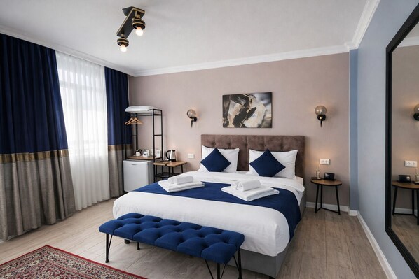 Premium bedding, memory foam beds, in-room safe, blackout drapes