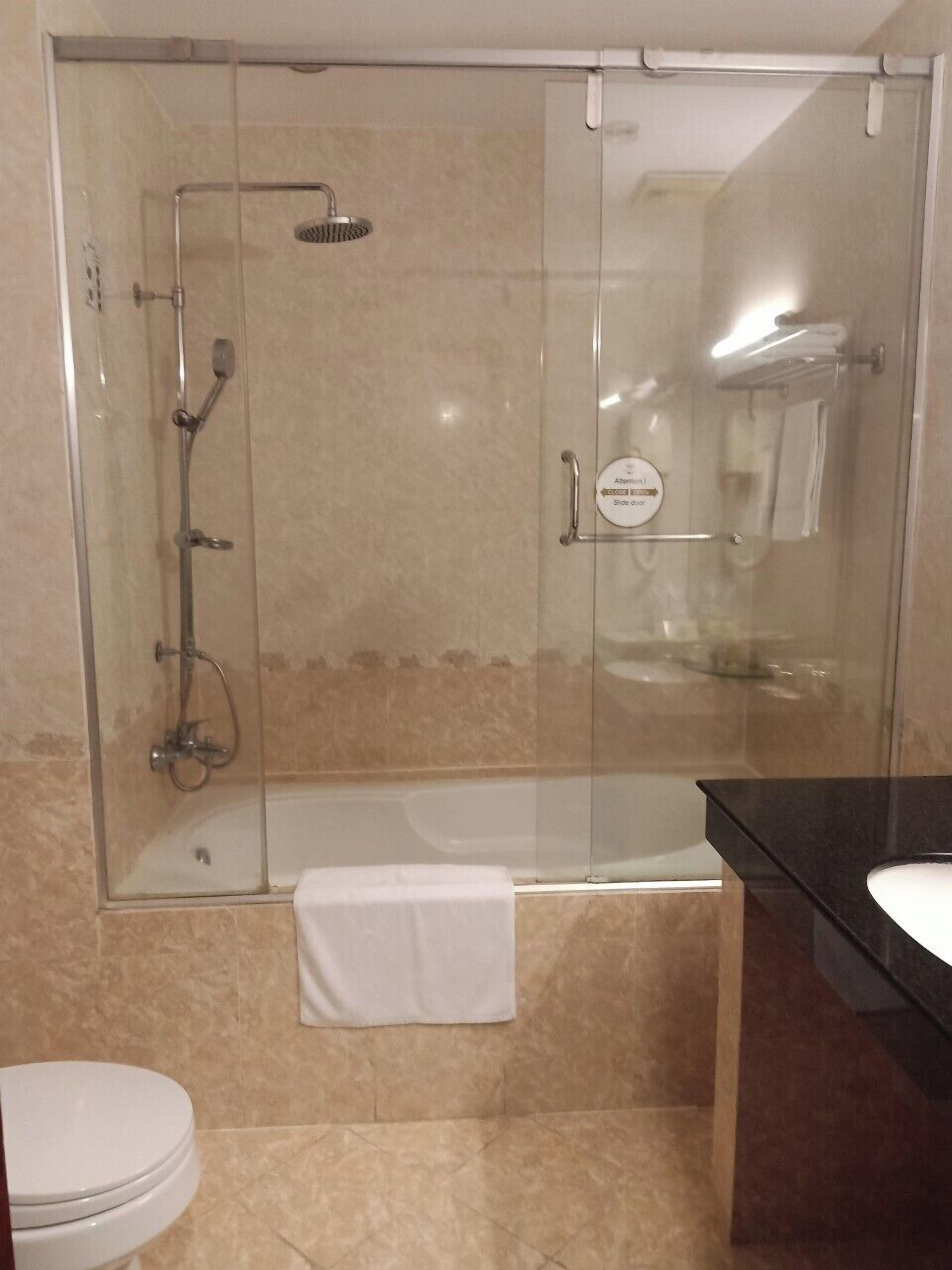 one bedroom deluxe | bathroom | slippers