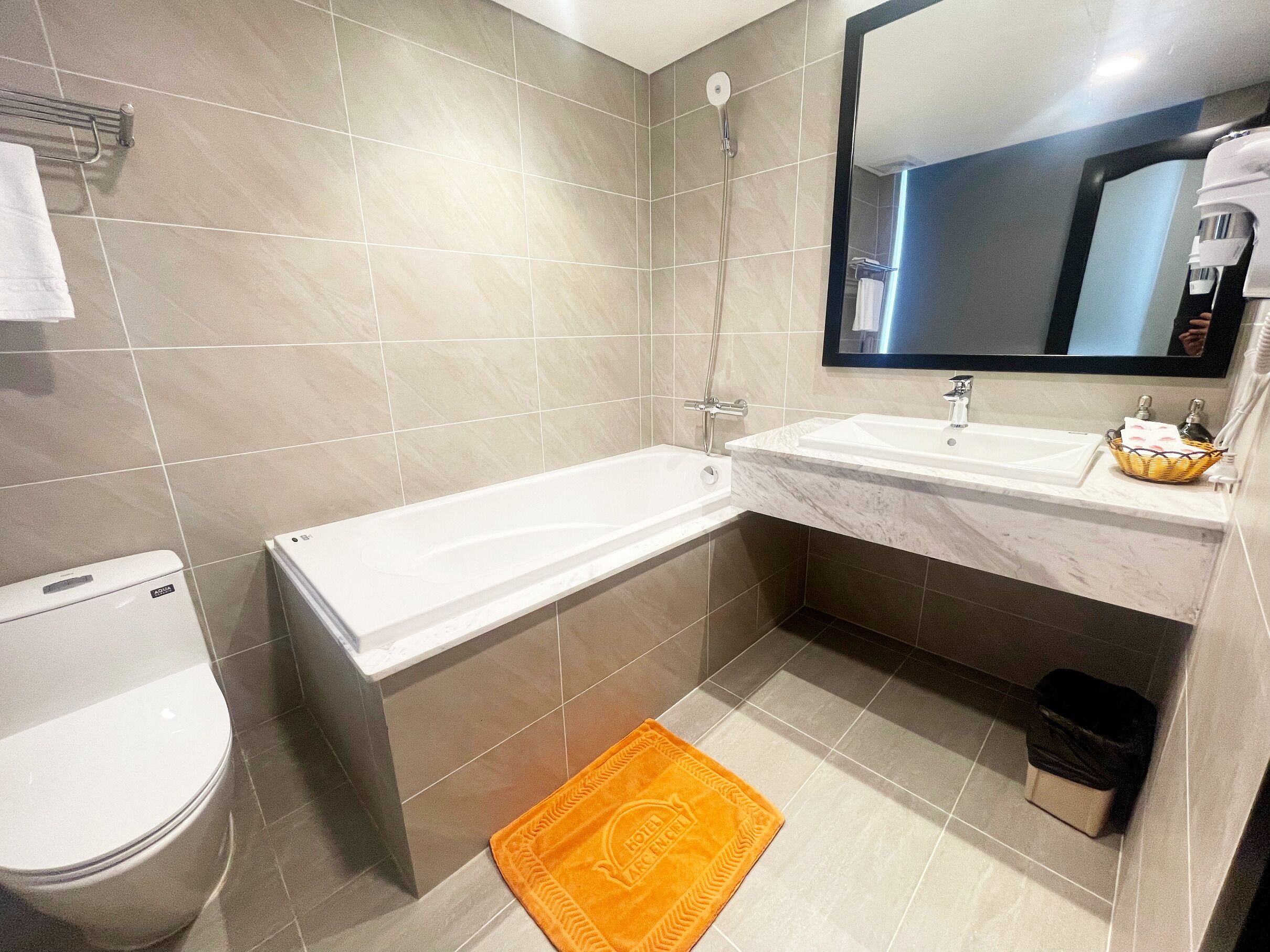 Shower, free toiletries, hair dryer, slippers