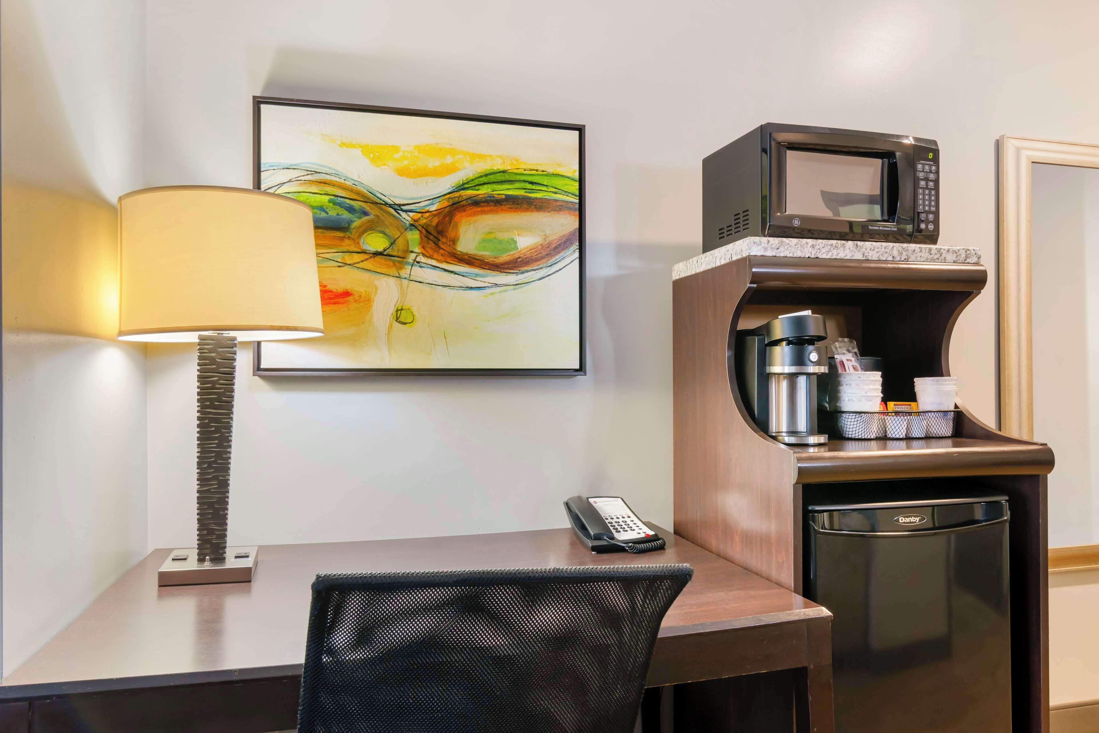 premium bedding, desk, laptop workspace, blackout curtains