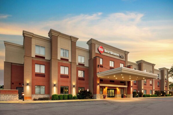 A Best Western Plus hotel with a modern facade, multiple windows, and a covered entrance. - Best Western Plus Olathe Hotel (Olathe)