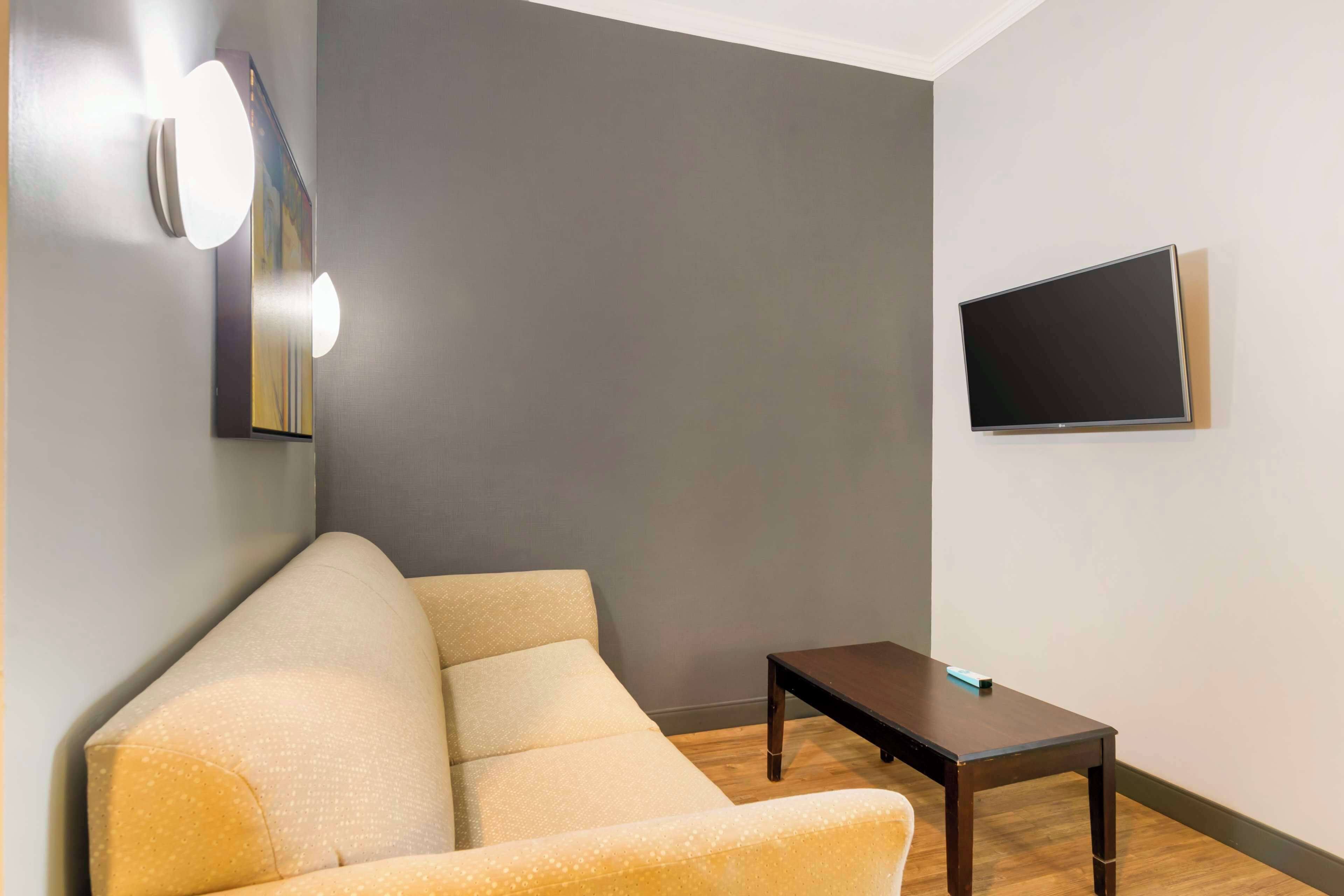 standard room, 1 king bed, non smoking, refrigerator & microwave (with sofabed) | premium bedding, desk, laptop workspace, blackout curtains