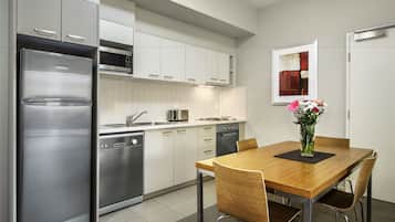 Microwave, coffee/tea maker, electric kettle, cookware/dishes/utensils