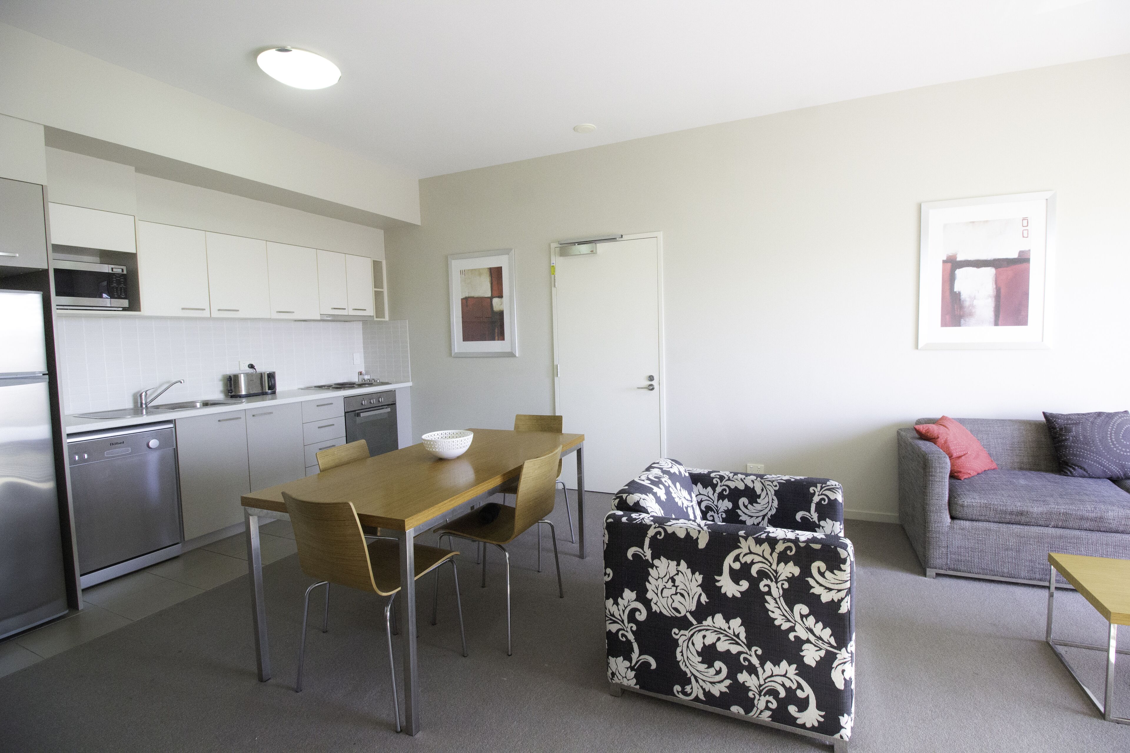 microwave, coffee/tea maker, electric kettle, cookware/dishes/utensils