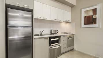 Microwave, coffee/tea maker, electric kettle, cookware/dishes/utensils