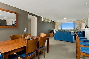 Family Apartment | Living area | 55-inch flat-screen TV with cable channels, Smart TV, DVD player