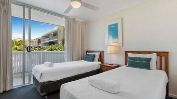 Deluxe Apartment, 2 Bedrooms, Pool View | 1 bedroom, premium bedding, individually furnished, iron/ironing board