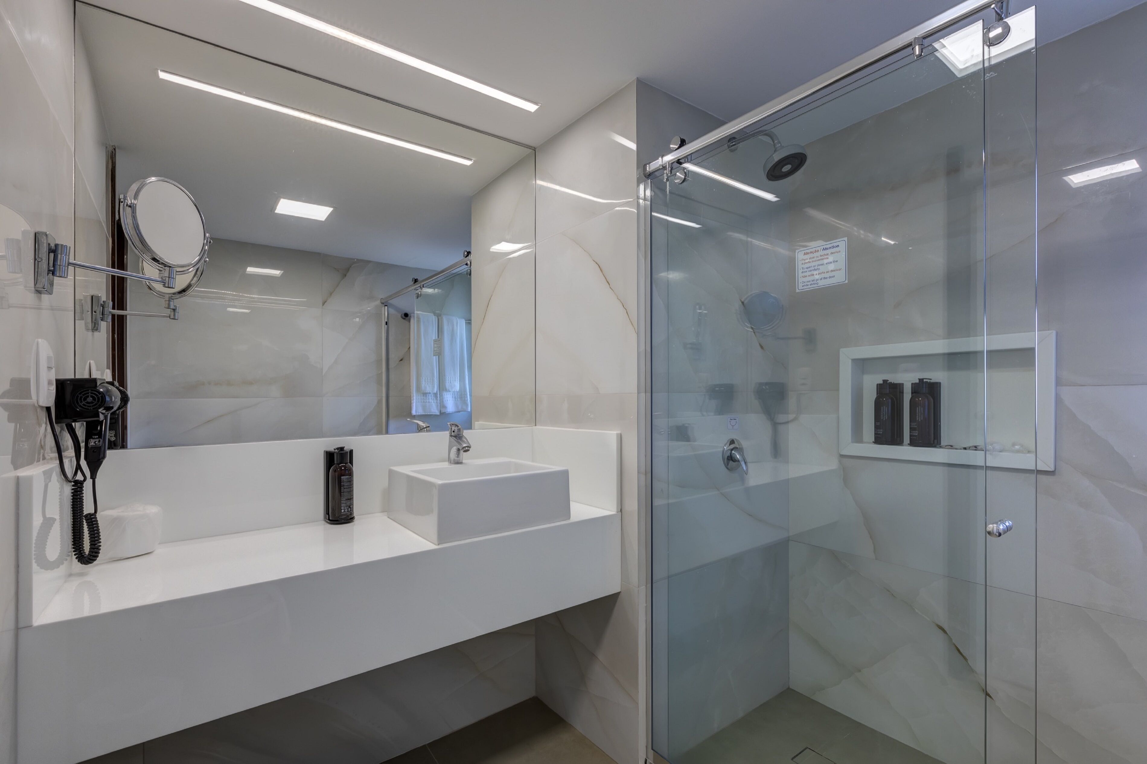 shower, eco-friendly toiletries, hair dryer, towels