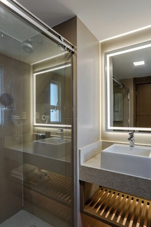 Shower, eco-friendly toiletries, hair dryer, towels