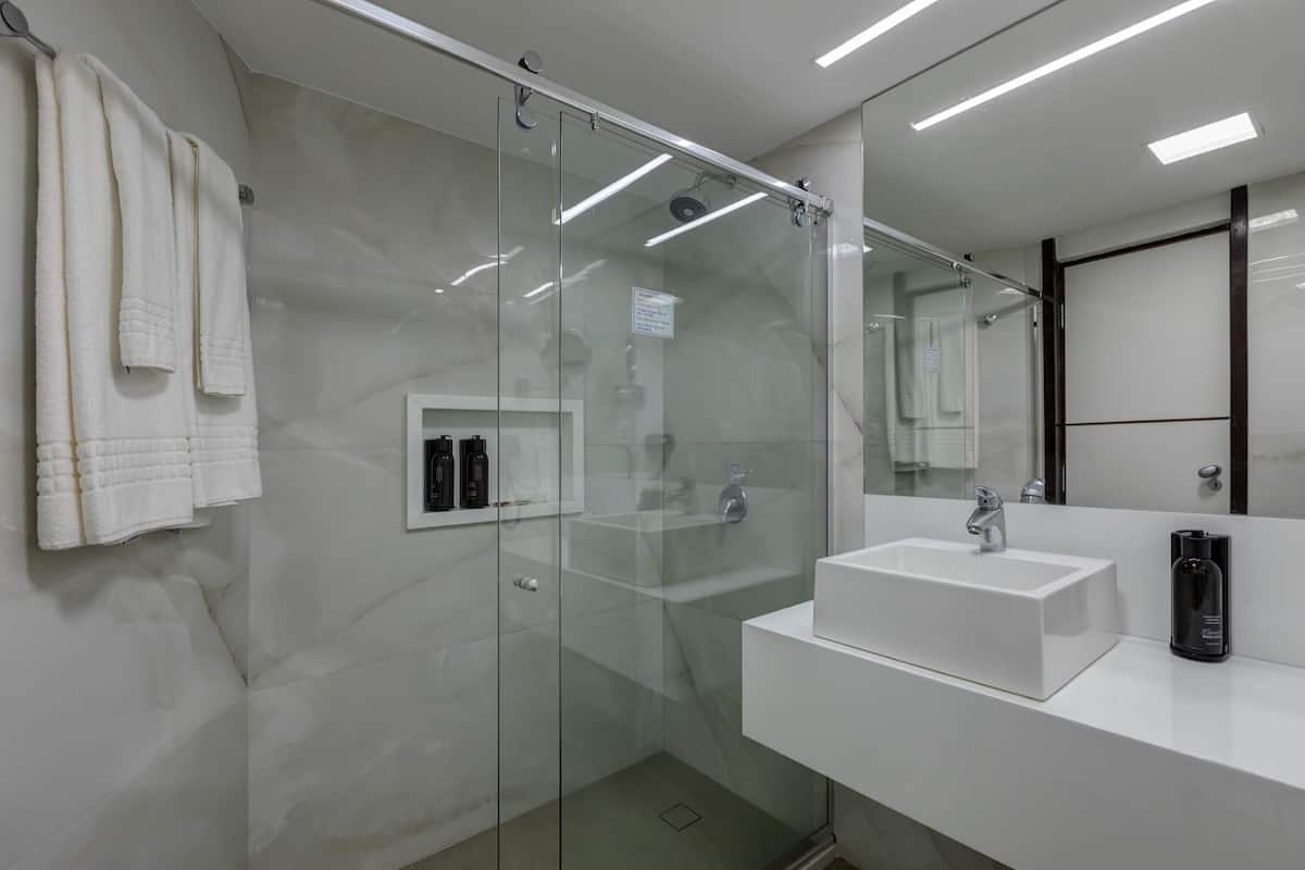 shower, eco-friendly toiletries, hair dryer, towels