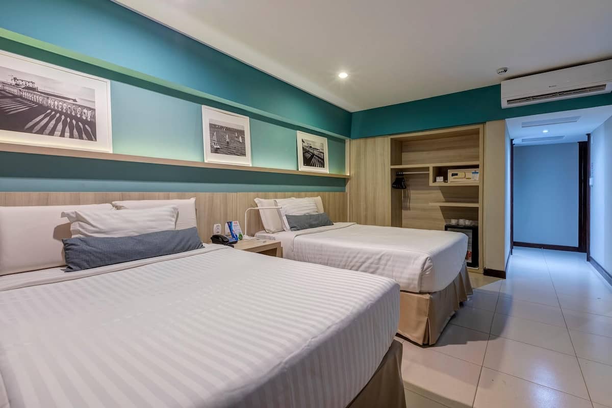 Minibar, caja de seguridad en la habitación y cortinas blackout