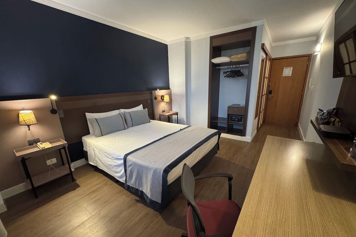 Executive Double Room | Minibar, in-room safe, laptop workspace, blackout curtains