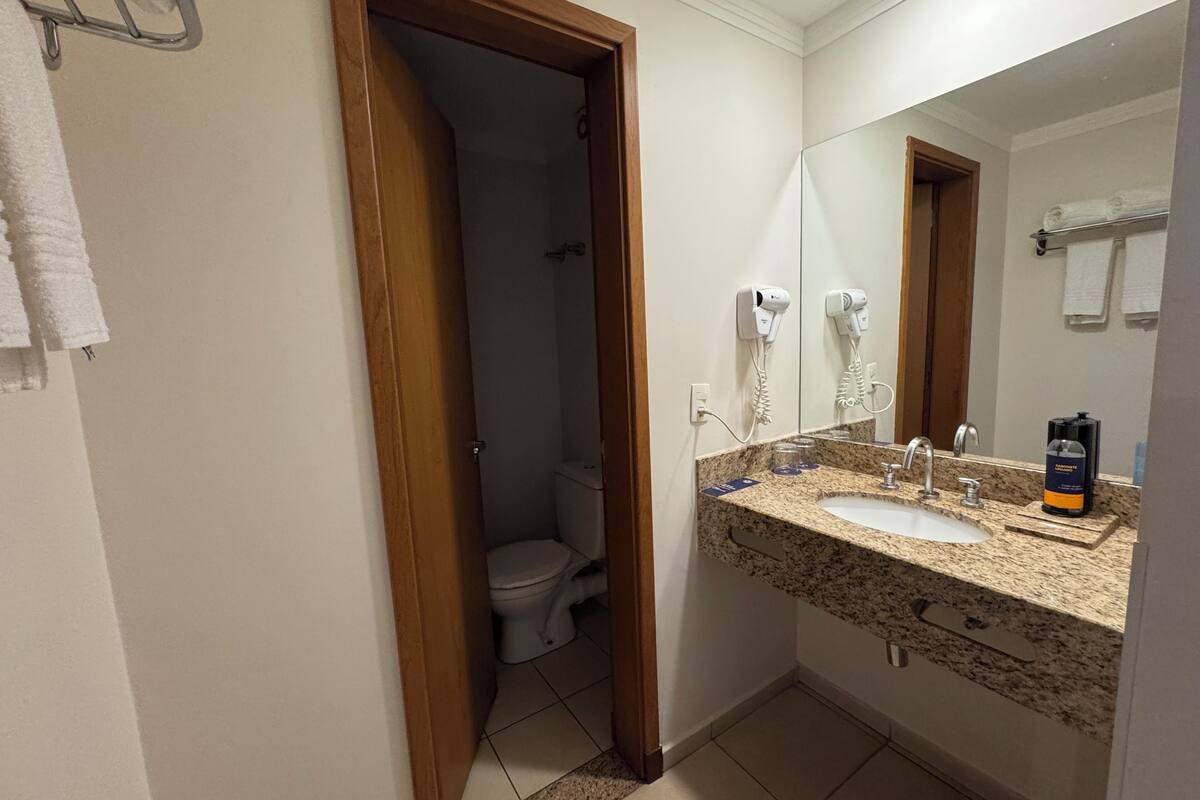superior twin room | bathroom | shower, hair dryer, towels