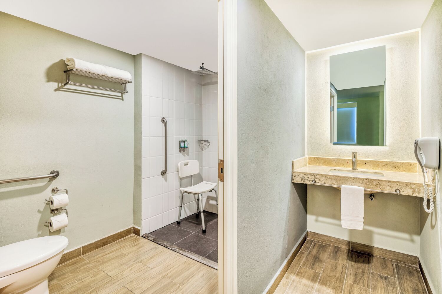 shower, rainfall showerhead, hair dryer, towels