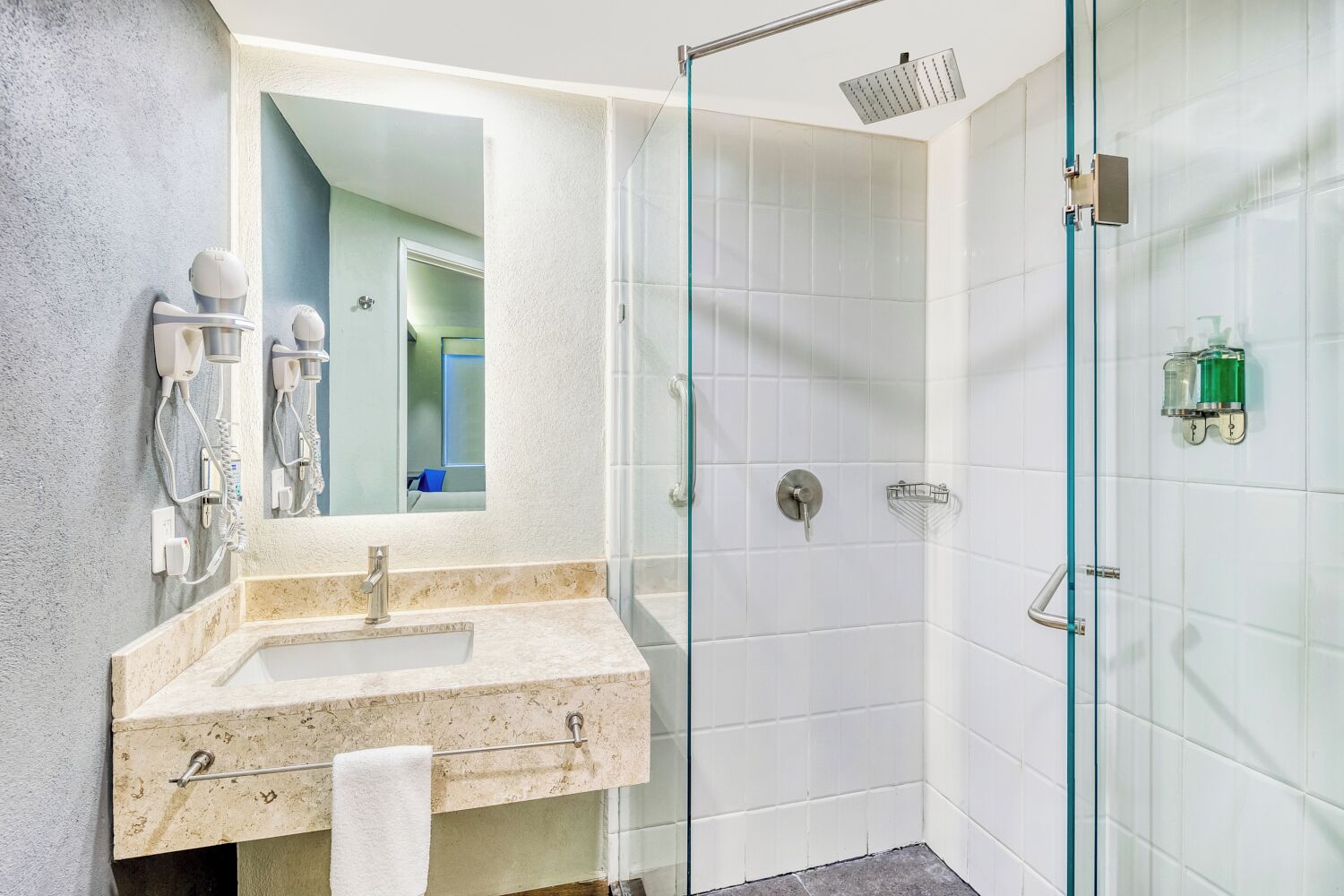 shower, rainfall showerhead, hair dryer, towels