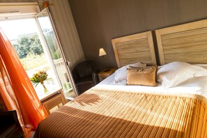 Room, Garden View | Minibar, in-room safe, individually decorated, desk - Hotel Almoria (Deauville)