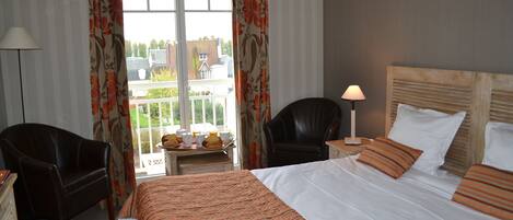 Minibar, in-room safe, individually decorated, desk