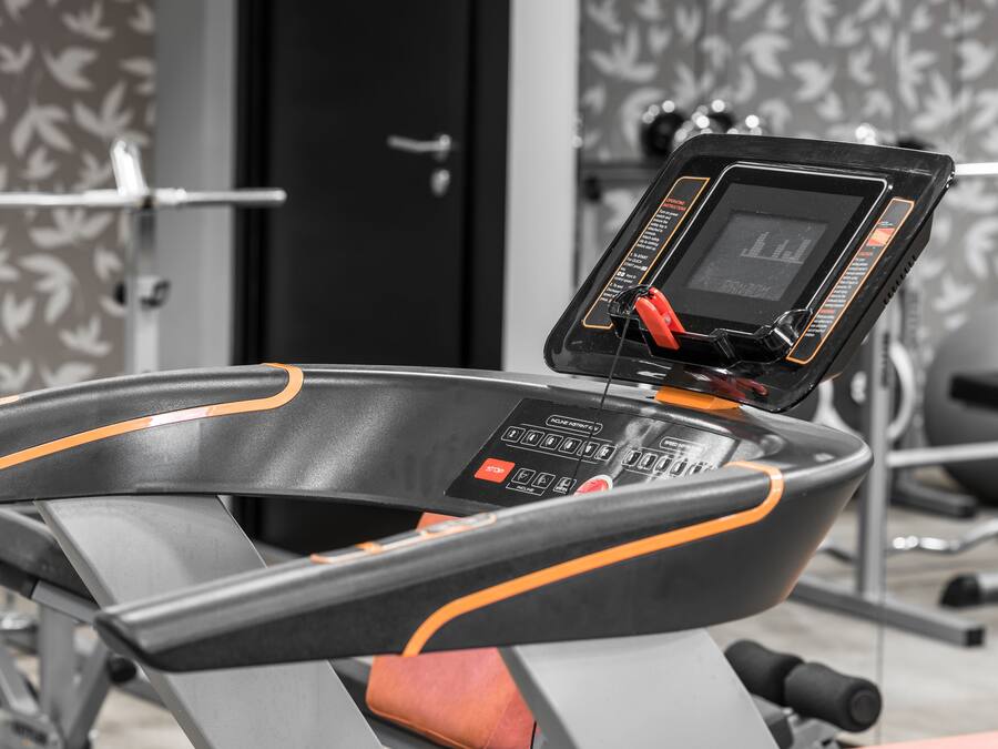 A stationary bike with a digital display and control panel.