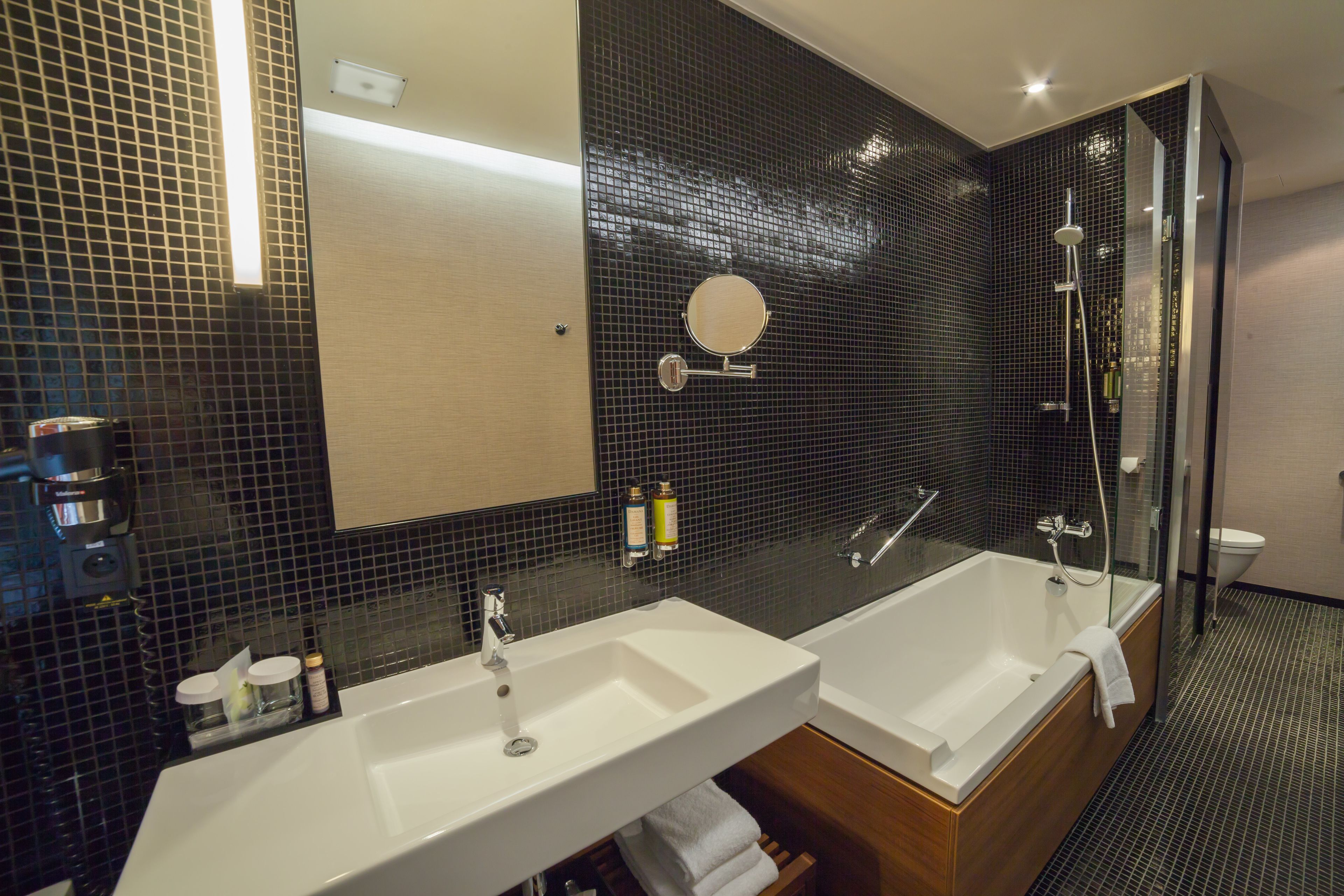 superior room | bathroom | deep-soaking bathtub, designer toiletries, hair dryer, towels