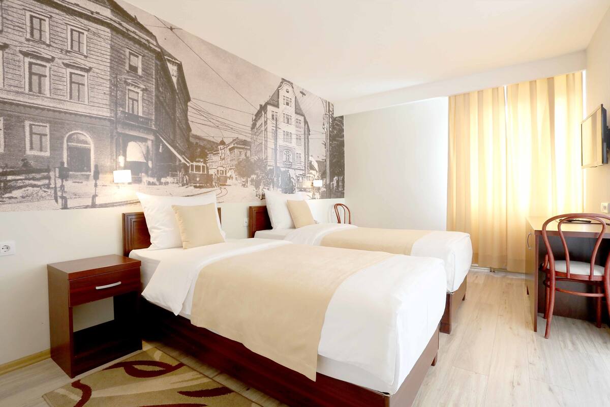 Luxe beddengoed, een kluis op de kamer, een bureau, gratis babybedden