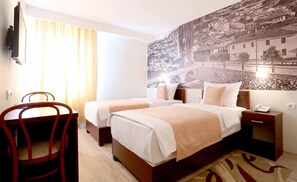 Premium bedding, in-room safe, desk, free cots/infant beds